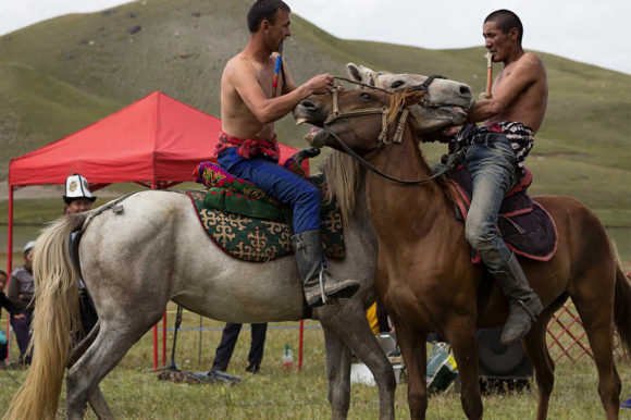 Horse games festival at Lenin Peak base camp in Pamir Alay mountain range